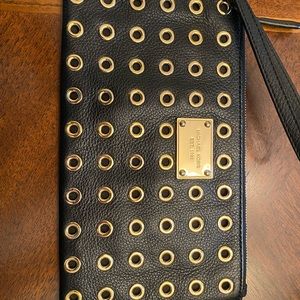 Michael Kors black with gold grommets wristlet